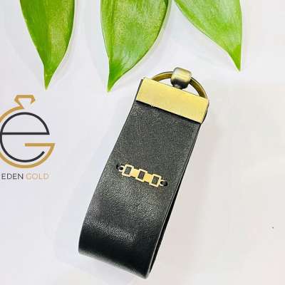 جاسوئیچی طلا و چرم