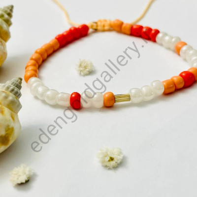 دستبند طلا استوانه کوچک بند سفید و نارنجی